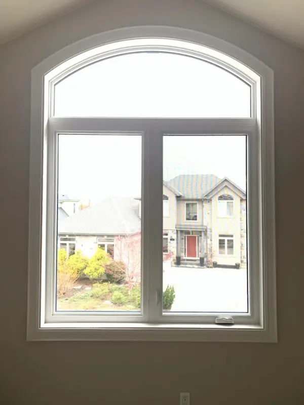 Arched window installation by Great Northern Home Exteriors