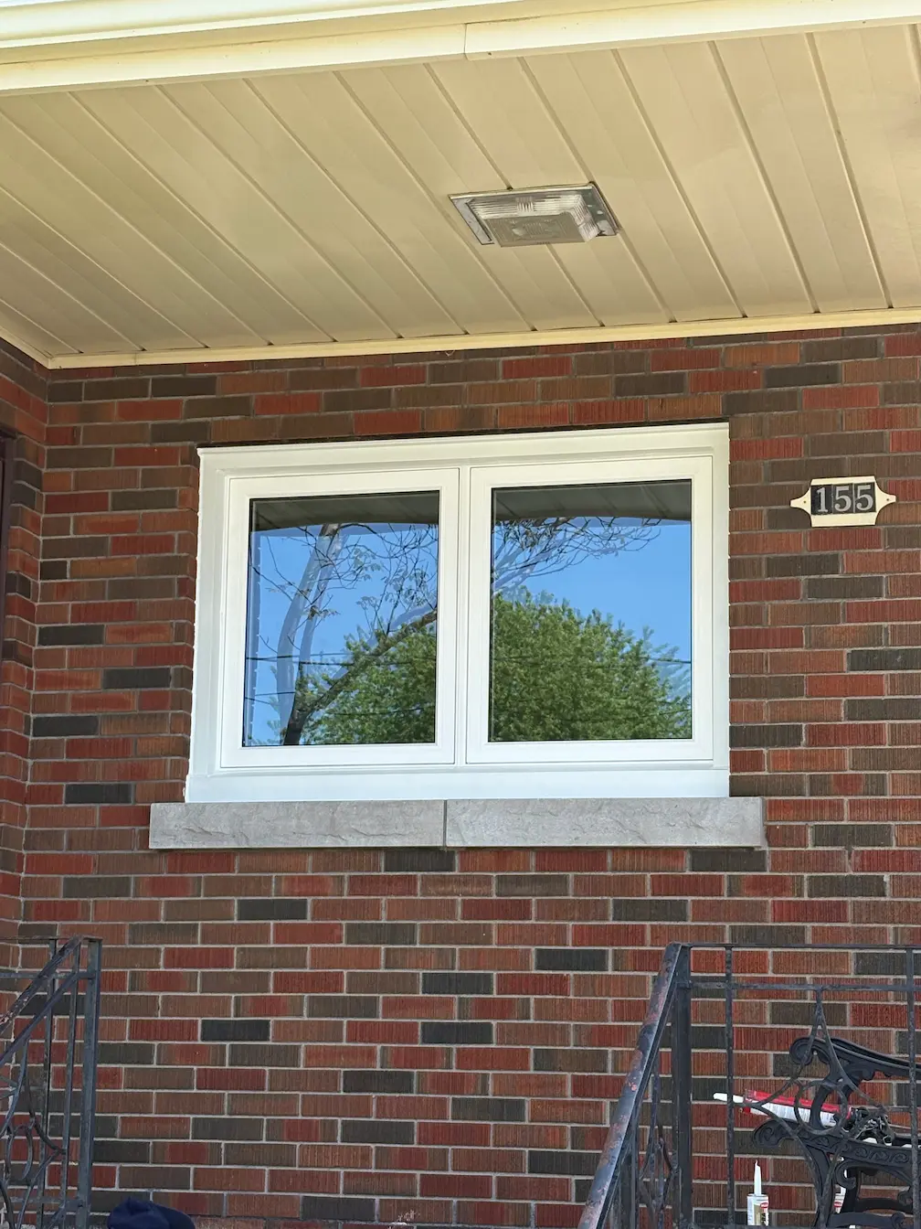 Side by side casement windows installed by Great Northern Home Exteriors