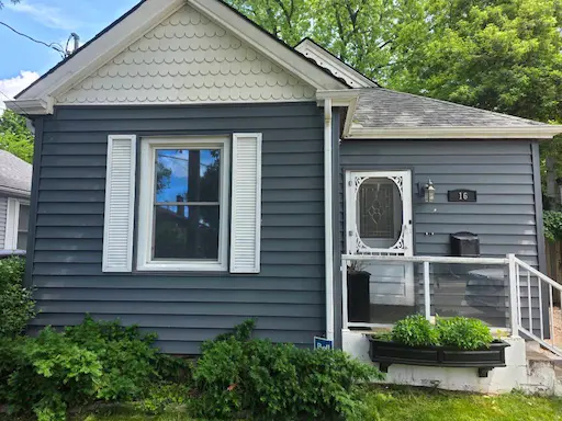 Heron Blue horizontal siding with contrasting white trim