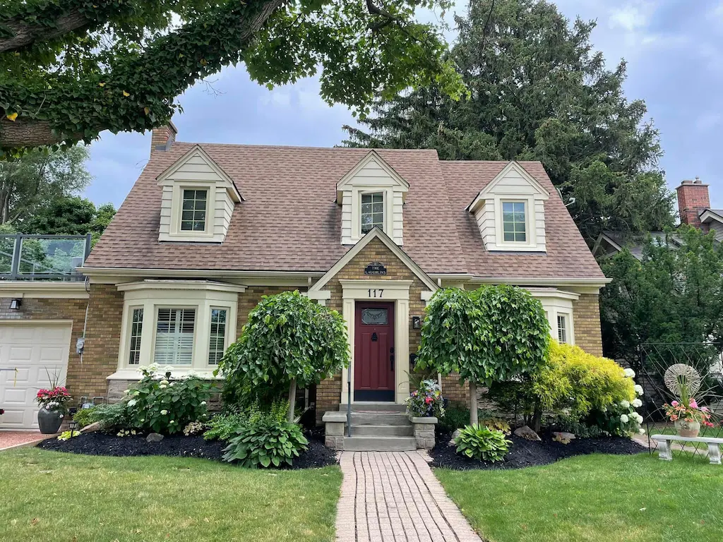 Ivory bay windows and upper casement windows installed by Great Northern Home Exteriors