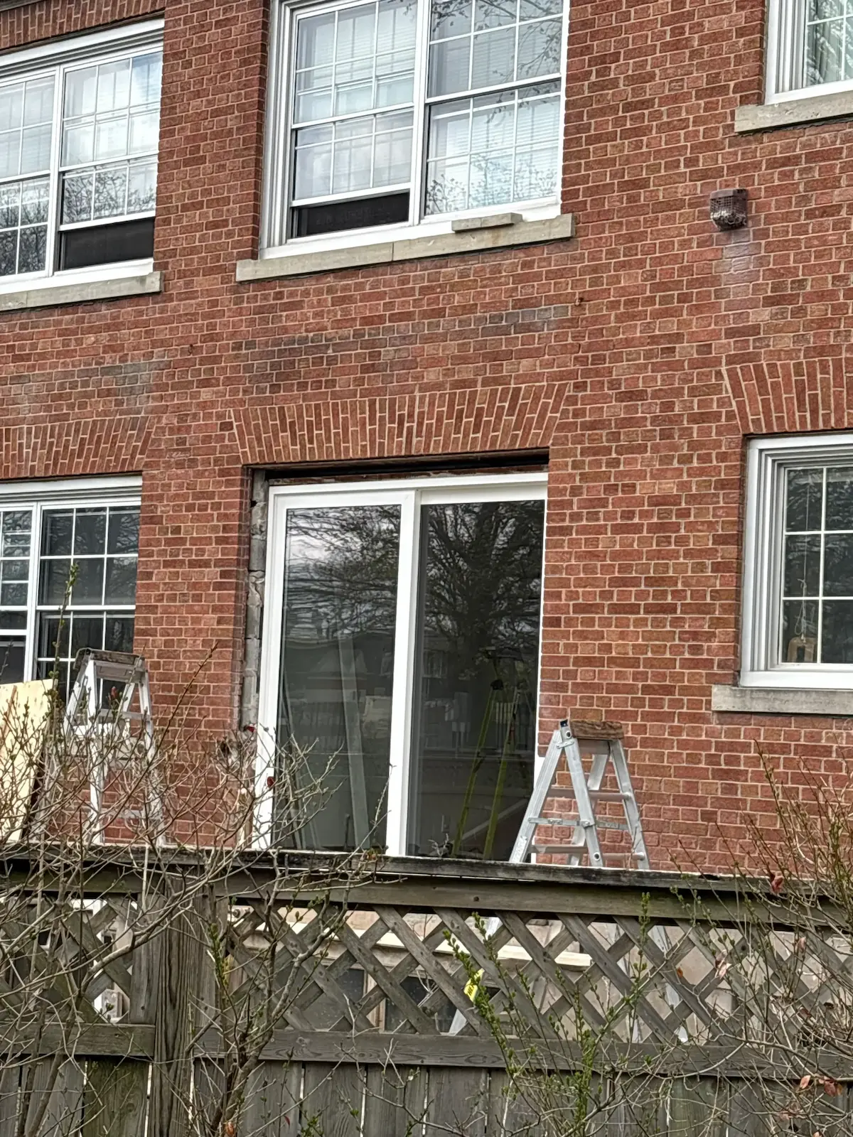KV patio door installed before exterior capping is completed