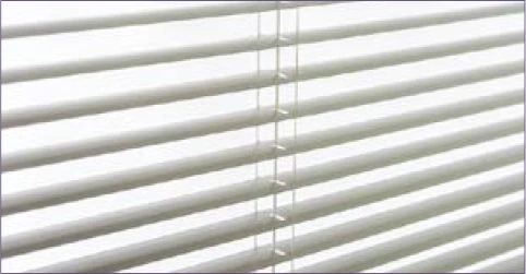 Close-up of built-in mini blinds inside patio door glass