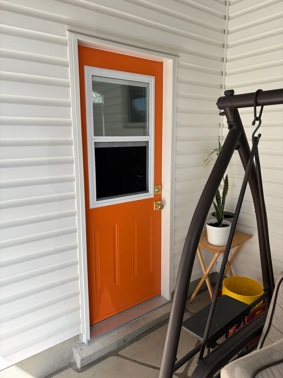 Orange Dorplex venting door installed by GNHE in Niagara Falls