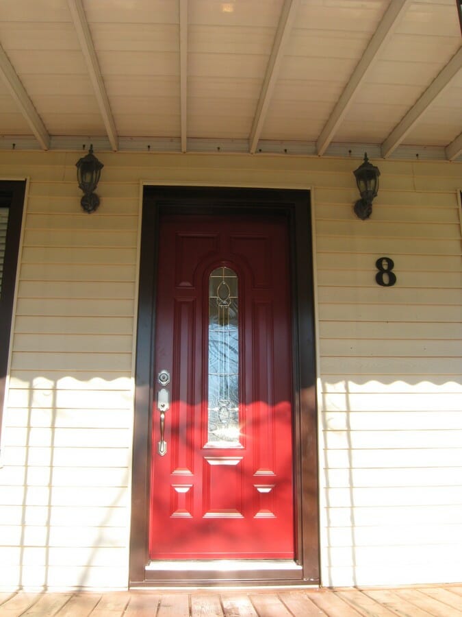 Painted Red Steel Door With Brown Capping