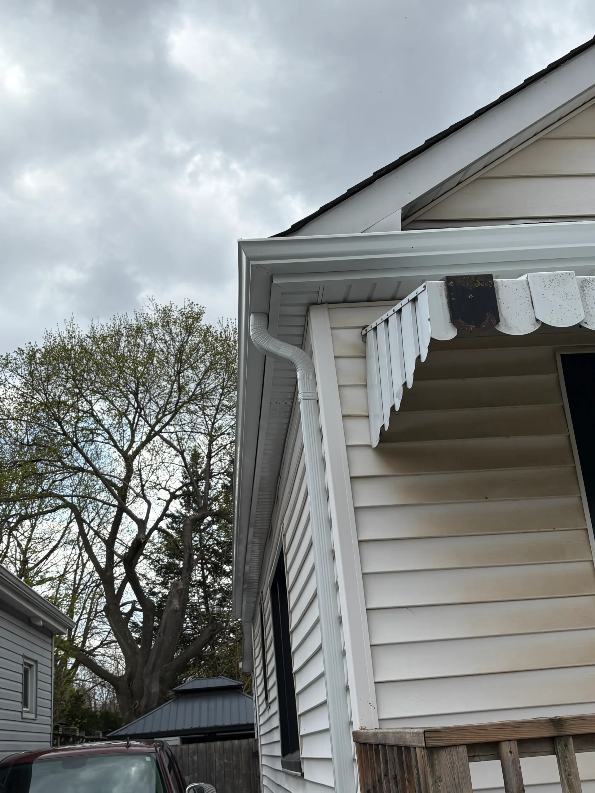 White eavestrough exterior installation finish