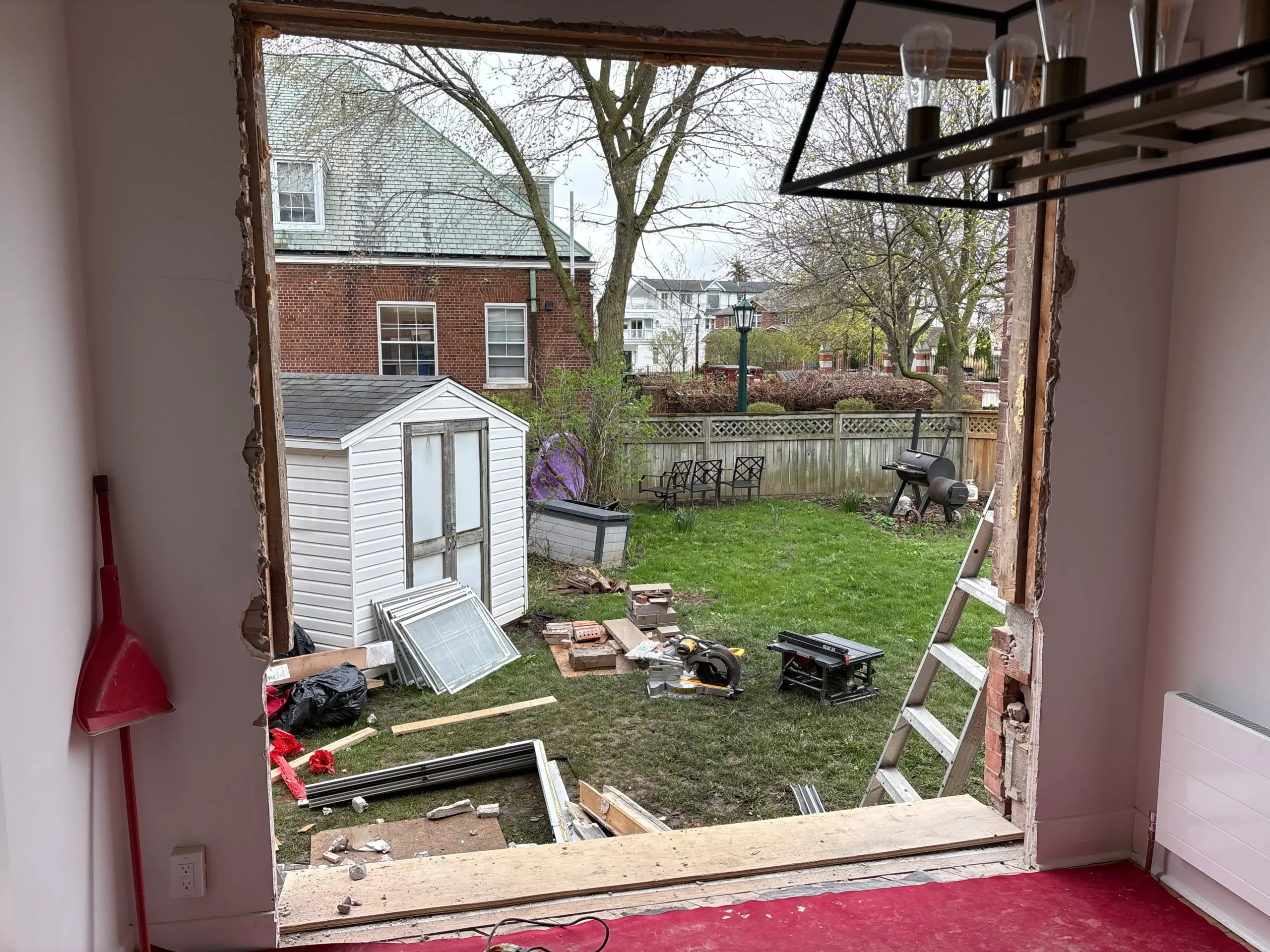 Interior wall opened up for patio door conversion