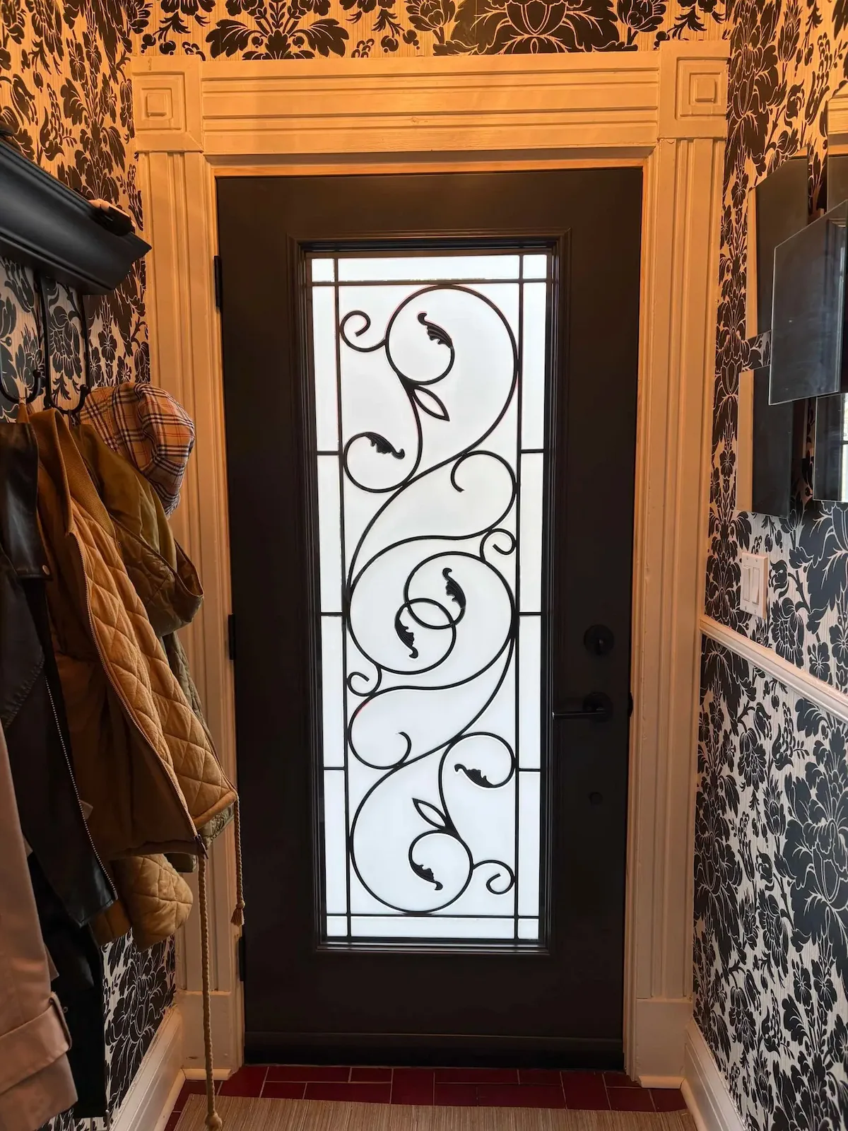 Wrought iron steel entry door interior view installed by Great Northern Home Exteriors