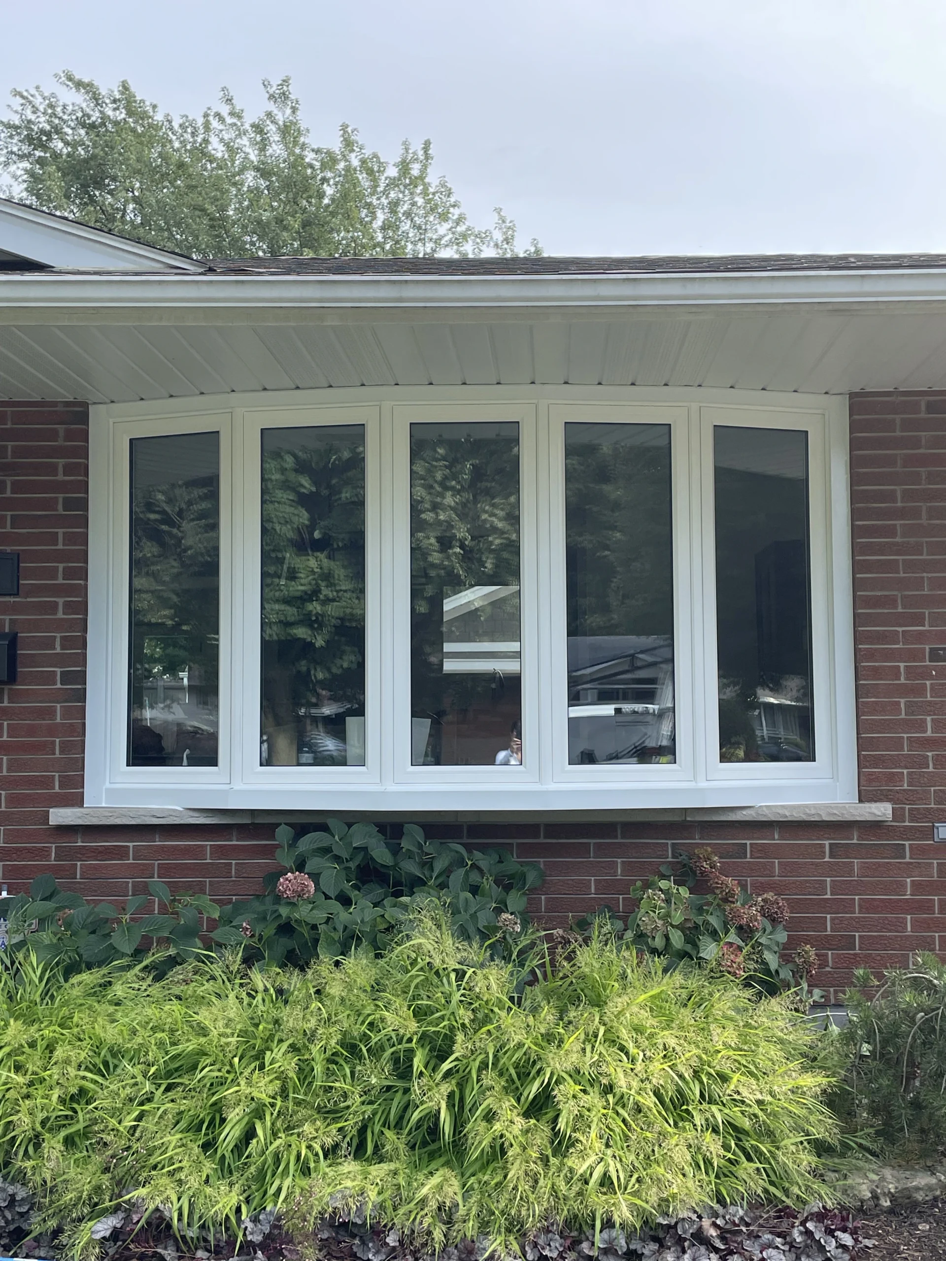Bow window installation by Great Northern Home Exteriors