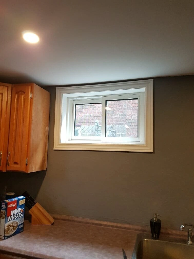 Sliding window installation by Great Northern Home Exteriors